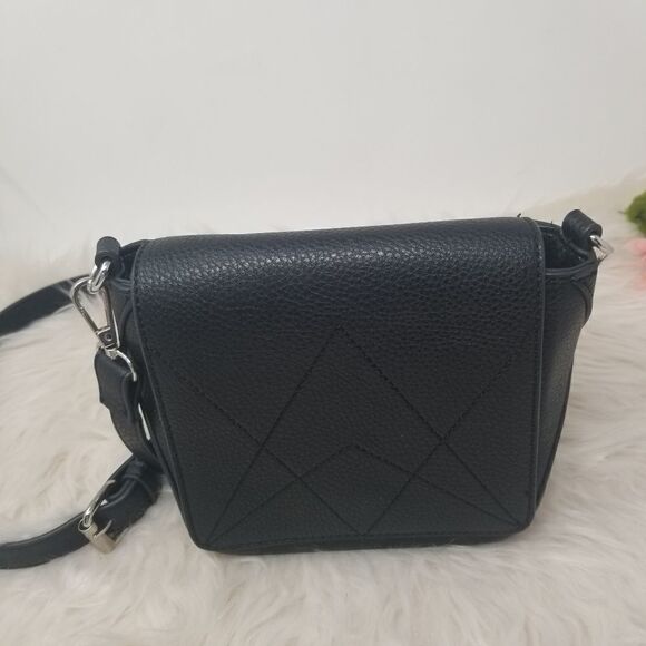 The Purse with a "C" tag inside. - Picture 6 of 10